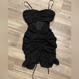 Every girl needs a Black Ruched Mini dress and here it is , it’s all yours !!